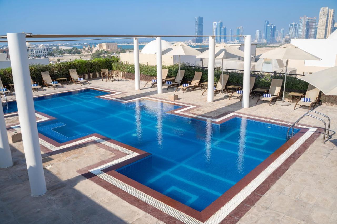 Mövenpick Hotel Apartments Al Mamzar Dubai Exterior foto Pool at the hotel